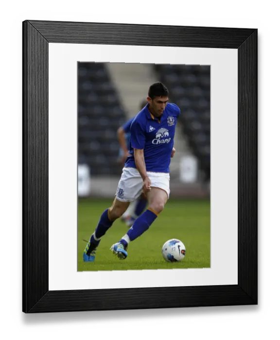 Framed Print : Denis Stracqualursi in Action: Everton vs. Aston Villa, Barclays Premier Reserve League (September 13, 2011) Framed Print : Denis Stracqualursi in Action: Everton vs. Aston Villa, Barclays Premier Reserve League (September 13, 2011)