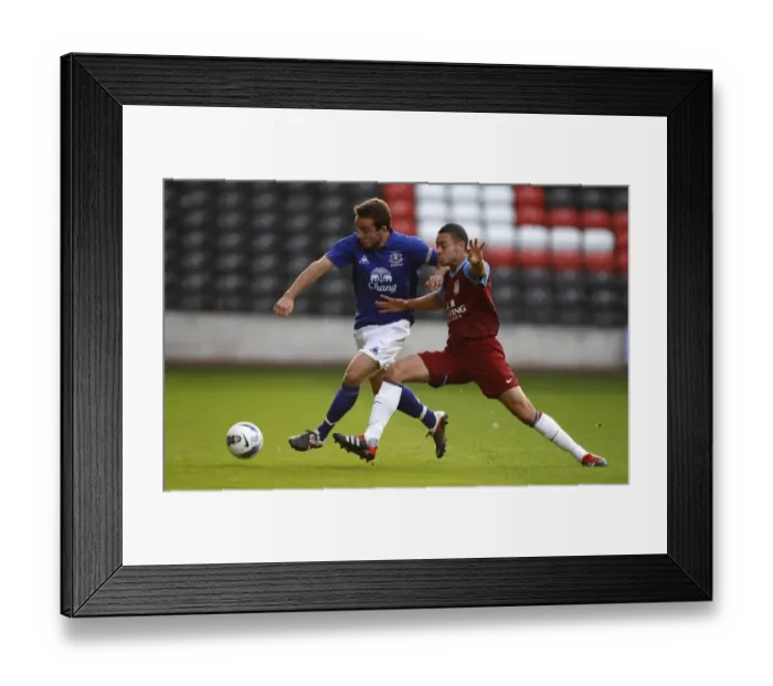 Framed Print : Jose Baxter vs. Aston Villa: Everton's Star Midfielder Faces Off in Barclays Premier Reserve League at Halton Stadium Framed Print : Jose Baxter vs. Aston Villa: Everton's Star Midfielder Faces Off in Barclays Premier Reserve League at Halton Stadium