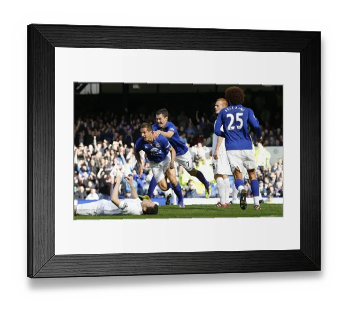 Framed Print : Everton's Jagielka Scores the Opener: Everton FC vs Wigan Athletic, Barclays Premier League, Goodison Park (September 17, 2011) Framed Print : Everton's Jagielka Scores the Opener: Everton FC vs Wigan Athletic, Barclays Premier League, Goodison Park (September 17, 2011)