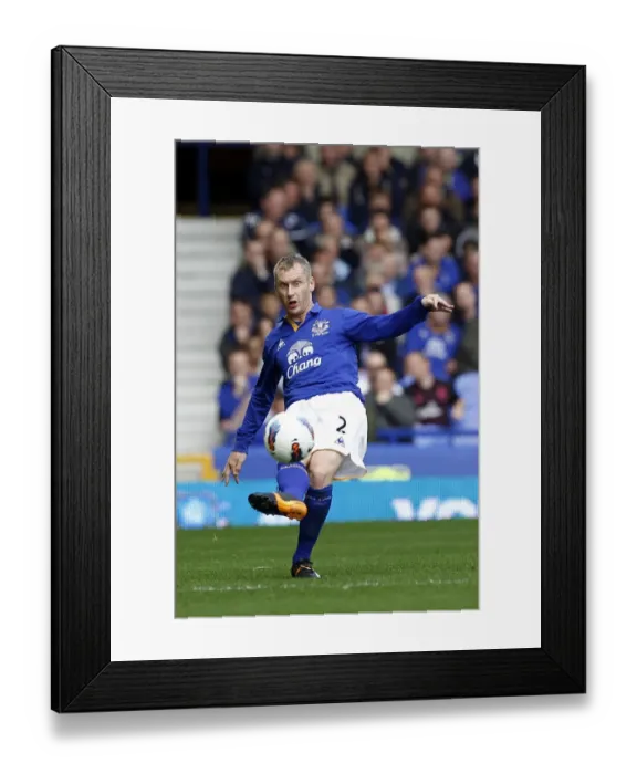 Framed Print : Everton's Tony Hibbert in Action: Everton vs Wigan Athletic, Barclays Premier League (September 17, 2011) - Goodison Park Framed Print : Everton's Tony Hibbert in Action: Everton vs Wigan Athletic, Barclays Premier League (September 17, 2011) - Goodison Park