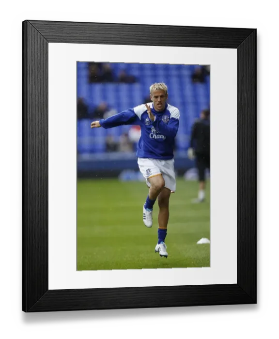 Framed Print : Phil Neville at Goodison Park: Everton vs Wigan Athletic, Barclays Premier League (September 17, 2011)