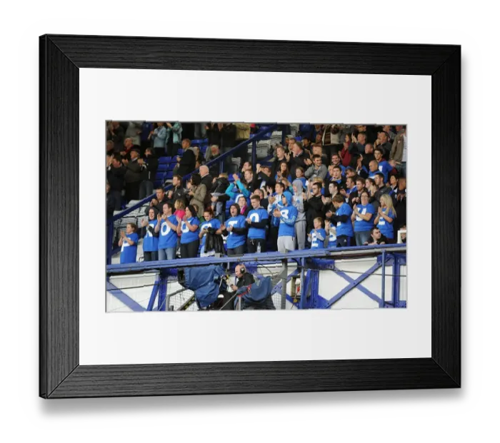 Framed Print : Proud to be Blue: Everton Fans Unite in Sea of T-Shirts at Goodison Park (Everton vs Wigan Athletic, Barclays Premier League, 17 September 2011)