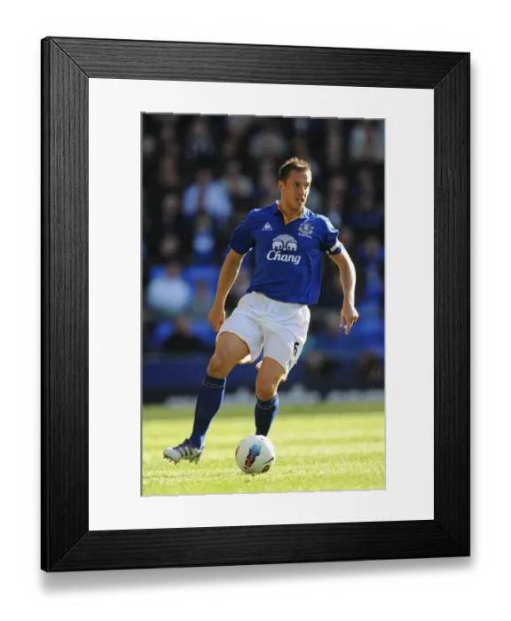 Framed Print : Phil Jagielka in Action: Everton vs Wigan Athletic, Barclays Premier League, Goodison Park (September 17, 2011) Framed Print : Phil Jagielka in Action: Everton vs Wigan Athletic, Barclays Premier League, Goodison Park (September 17, 2011)
