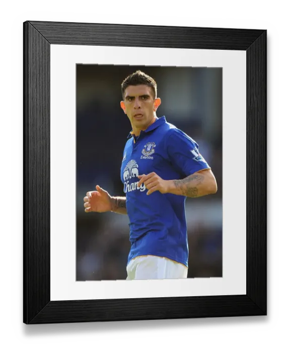 Framed Print : Everton's Denis Stracqualursi in Action: Premier League Clash Against Wigan Athletic (September 17, 2011) Framed Print : Everton's Denis Stracqualursi in Action: Premier League Clash Against Wigan Athletic (September 17, 2011)