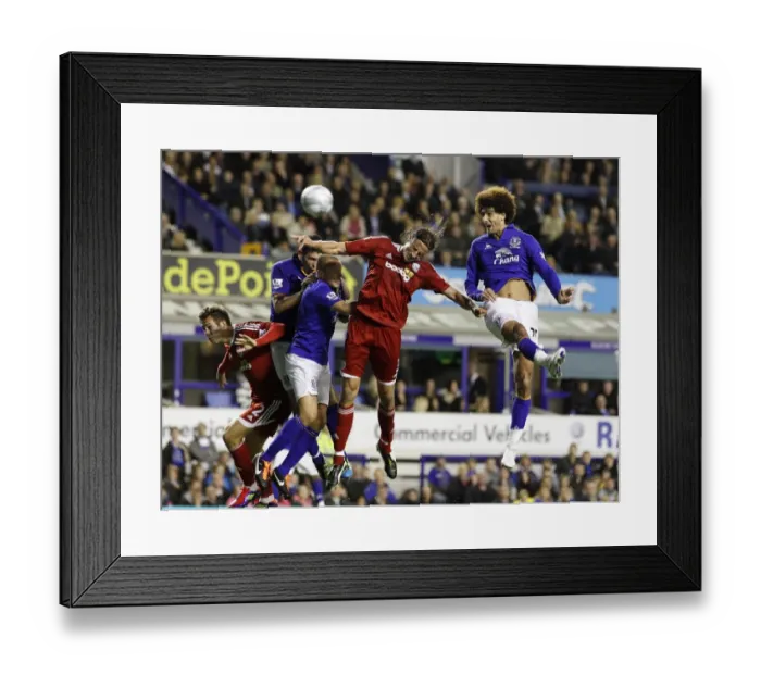 Framed Print : Fellaini vs. Olsson: A Battle for the Ball in Everton's Carling Cup Clash against West Bromwich Albion Framed Print : Fellaini vs. Olsson: A Battle for the Ball in Everton's Carling Cup Clash against West Bromwich Albion