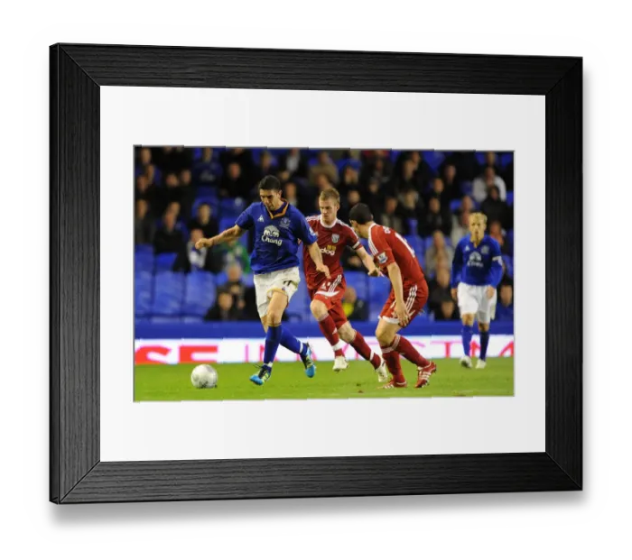 Framed Print : Everton's Stracqualursi Slips Past West Brom Defenders in Carling Cup Showdown Framed Print : Everton's Stracqualursi Slips Past West Brom Defenders in Carling Cup Showdown