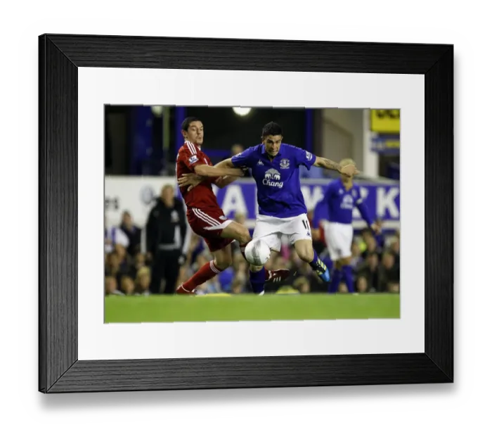 Framed Print : Stracqualursi vs Dorrans: A Battle for Ball Supremacy in Everton's Carling Cup Clash against West Bromwich Albion Framed Print : Stracqualursi vs Dorrans: A Battle for Ball Supremacy in Everton's Carling Cup Clash against West Bromwich Albion