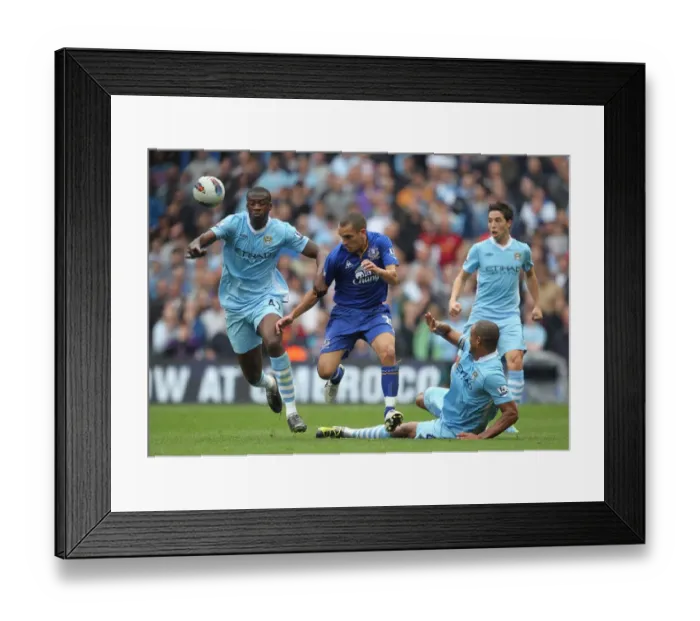Framed Print : Toure and Kompany vs. Osman: Manchester City vs. Everton Clash (Premier League 2011) Framed Print : Toure and Kompany vs. Osman: Manchester City vs. Everton Clash (Premier League 2011)