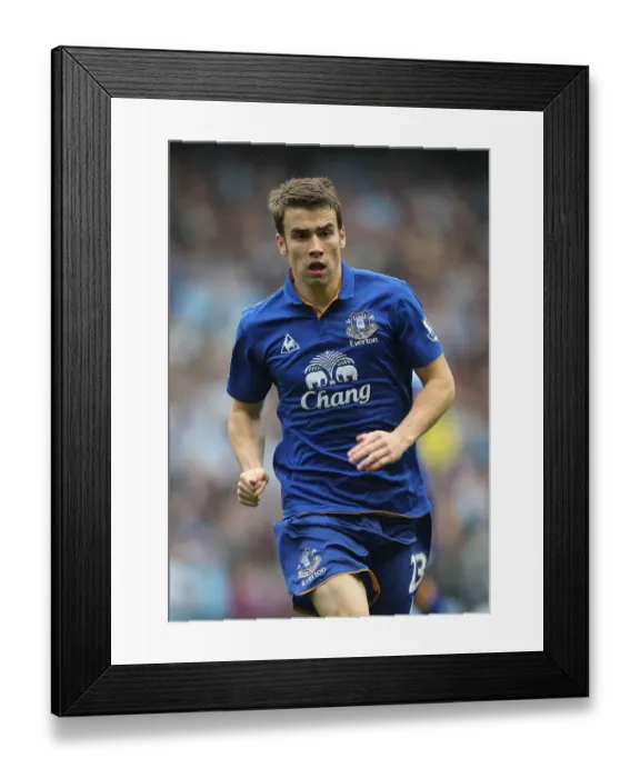 Framed Print : Seamus Coleman vs Manchester City: Everton's Defender Faces Off in the Barclays Premier League (24 September 2011) Framed Print : Seamus Coleman vs Manchester City: Everton's Defender Faces Off in the Barclays Premier League (24 September 2011)