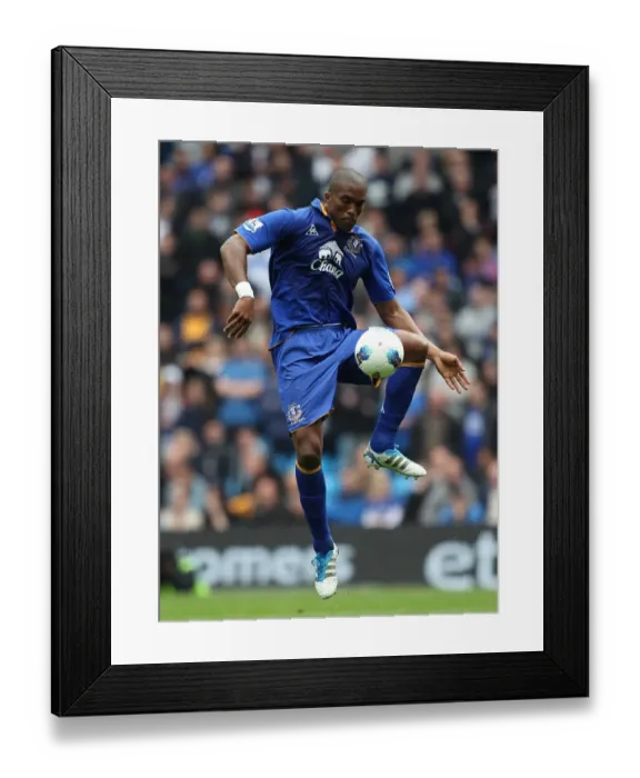 Framed Print : Everton's Battle at Etihad Stadium: Sylvain Distin Stands Firm Against Manchester City (Barclays Premier League, 24 September 2011) Framed Print : Everton's Battle at Etihad Stadium: Sylvain Distin Stands Firm Against Manchester City (Barclays Premier League, 24 September 2011)