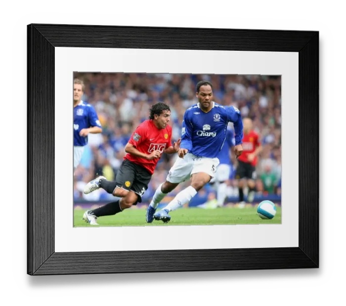Framed Print : Football - Everton v Manchester United Barclays Premier League - Goodison Park - 15 / 9 / 07 Evertons Joleon Lescott (R) and Manchester Uniteds Carlos Tevez in action Mandatory Credit: Action Images / Matthew Framed Print : Football - Everton v Manchester United Barclays Premier League - Goodison Park - 15 / 9 / 07 Evertons Joleon Lescott (R) and Manchester Uniteds Carlos Tevez in action Mandatory Credit: Action Images / Matthew