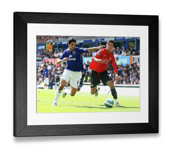 Framed Print : Mikel Arteta vs Cristiano Ronaldo: Everton vs Manchester United Clash in Premier League, 2007 Framed Print : Mikel Arteta vs Cristiano Ronaldo: Everton vs Manchester United Clash in Premier League, 2007