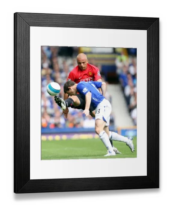 Framed Print : Clash of Titans: Baines vs. Brown at Goodison Park, Everton vs. Manchester United, 2007 Framed Print : Clash of Titans: Baines vs. Brown at Goodison Park, Everton vs. Manchester United, 2007