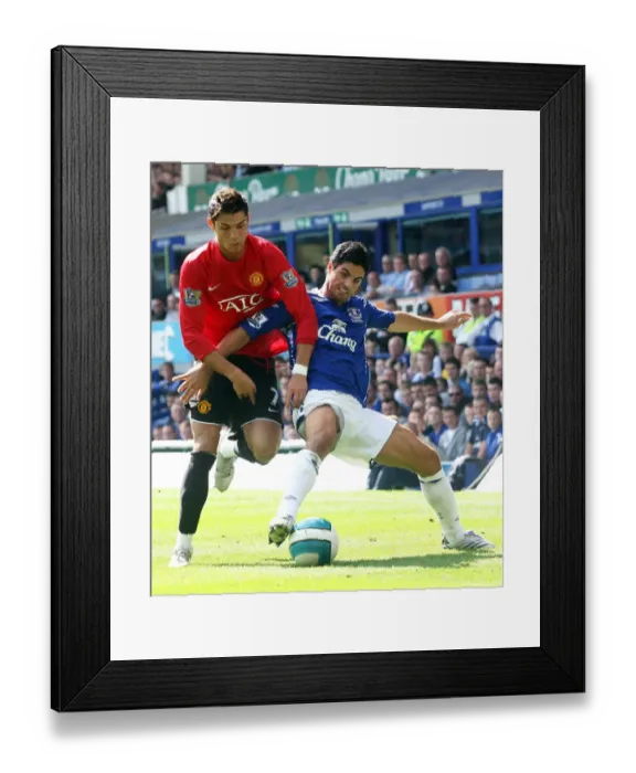Framed Print : Everton vs Manchester United: A Premier League Showdown - Arteta vs Ronaldo, 2007: Battle at Goodison Park Framed Print : Everton vs Manchester United: A Premier League Showdown - Arteta vs Ronaldo, 2007: Battle at Goodison Park