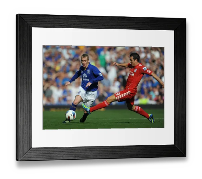 Framed Print : Battle at Goodison Park: Stewart Downing vs. Tony Hibbert - Everton vs. Liverpool, Premier League (2011): A Clash of Determination Framed Print : Battle at Goodison Park: Stewart Downing vs. Tony Hibbert - Everton vs. Liverpool, Premier League (2011): A Clash of Determination