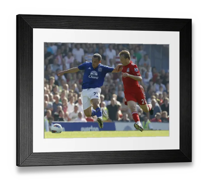 Framed Print : Osman vs Leiva: A Premier League Battle for the Ball at Goodison Park (1 October 2011) Framed Print : Osman vs Leiva: A Premier League Battle for the Ball at Goodison Park (1 October 2011)
