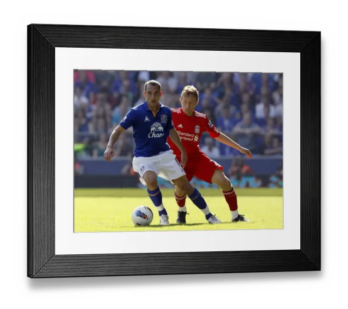 Framed Print : Battle for the Ball: Leiva vs. Osman in the Merseyside Derby (01 October 2011) Framed Print : Battle for the Ball: Leiva vs. Osman in the Merseyside Derby (01 October 2011)