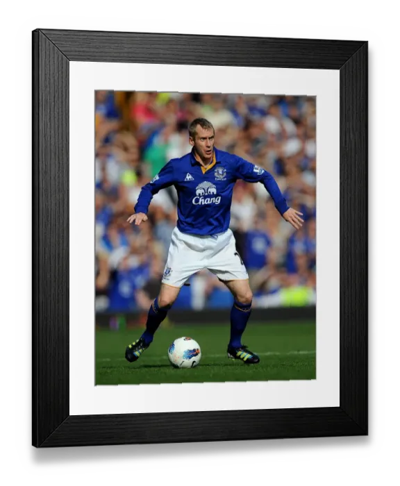Framed Print : Clash at Goodison Park: Tony Hibbert's Battle - Everton vs Liverpool (01 October 2011) Framed Print : Clash at Goodison Park: Tony Hibbert's Battle - Everton vs Liverpool (01 October 2011)