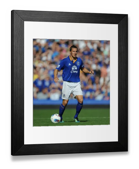 Framed Print : Phil Jagielka at Goodison Park: Everton vs Liverpool - Barclays Premier League Clash (1 October 2011)