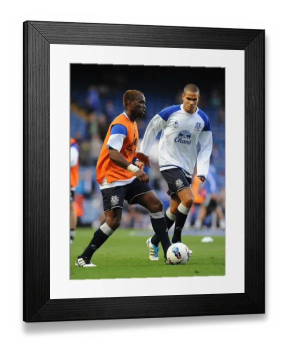 Framed Print : Everton's Saha and Rodwell Pre-Match Warm-Up at Stamford Bridge (15 October 2011) Framed Print : Everton's Saha and Rodwell Pre-Match Warm-Up at Stamford Bridge (15 October 2011)