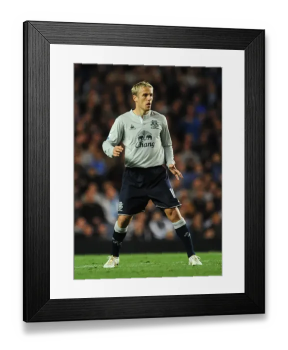 Framed Print : Phil Neville vs. Chelsea: Everton's Fierce Battle at Stamford Bridge (15 October 2011)