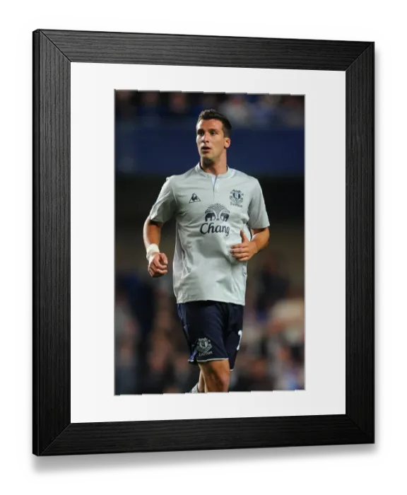 Framed Print : Apostolos Vellios vs. Chelsea: Everton's Battle at Stamford Bridge (15 October 2011)
