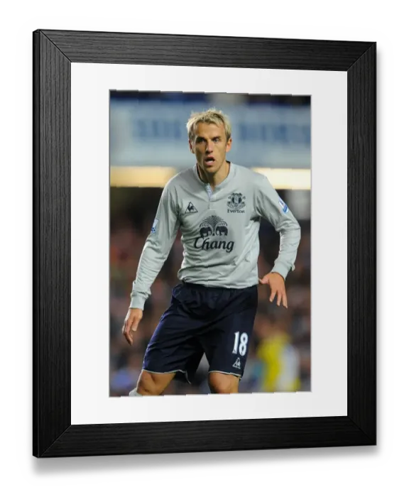 Framed Print : Phil Neville vs. Chelsea: A Fierce Face-Off at Stamford Bridge - Everton's Star Defender Takes on the Blues in the Barclays Premier League (15 October 2011) Framed Print : Phil Neville vs. Chelsea: A Fierce Face-Off at Stamford Bridge - Everton's Star Defender Takes on the Blues in the Barclays Premier League (15 October 2011)