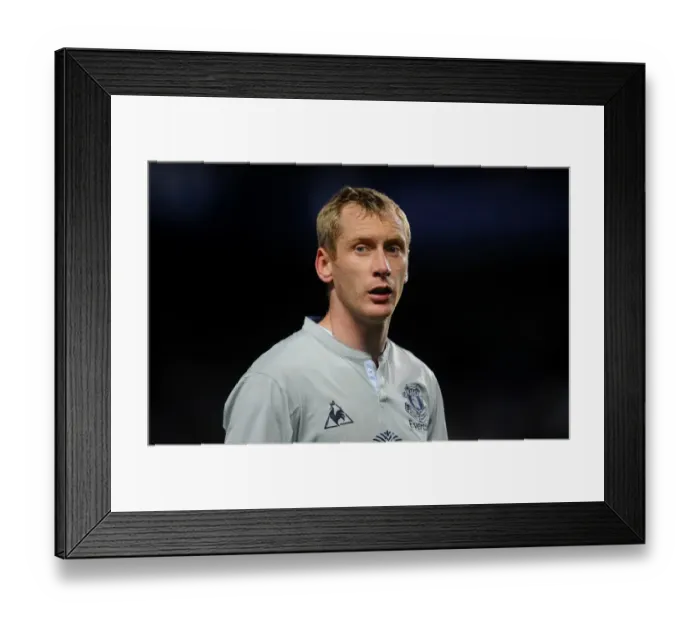 Framed Print : Everton's Tony Hibbert in Intense Face-Off against Chelsea at Stamford Bridge (2011) Framed Print : Everton's Tony Hibbert in Intense Face-Off against Chelsea at Stamford Bridge (2011)