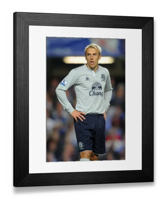 Framed Print : Phil Neville's Intense Rivalry: Everton vs. Chelsea (15 October 2011) Framed Print : Phil Neville's Intense Rivalry: Everton vs. Chelsea (15 October 2011)