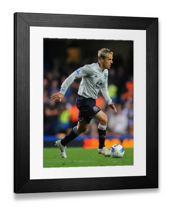 Framed Print : Phil Neville vs. Chelsea: Everton's Fierce Face-Off at Stamford Bridge (15 October 2011) Framed Print : Phil Neville vs. Chelsea: Everton's Fierce Face-Off at Stamford Bridge (15 October 2011)