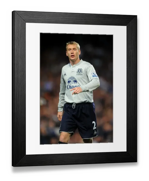 Framed Print : Tony Hibbert vs. Chelsea: A Fierce Face-Off at Stamford Bridge (15 October 2011) Framed Print : Tony Hibbert vs. Chelsea: A Fierce Face-Off at Stamford Bridge (15 October 2011)