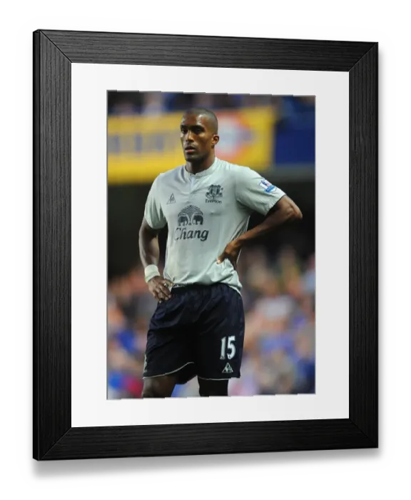 Framed Print : Distin at Stamford Bridge: Everton's Defender Faces Chelsea in Barclays Premier League (15 October 2011)