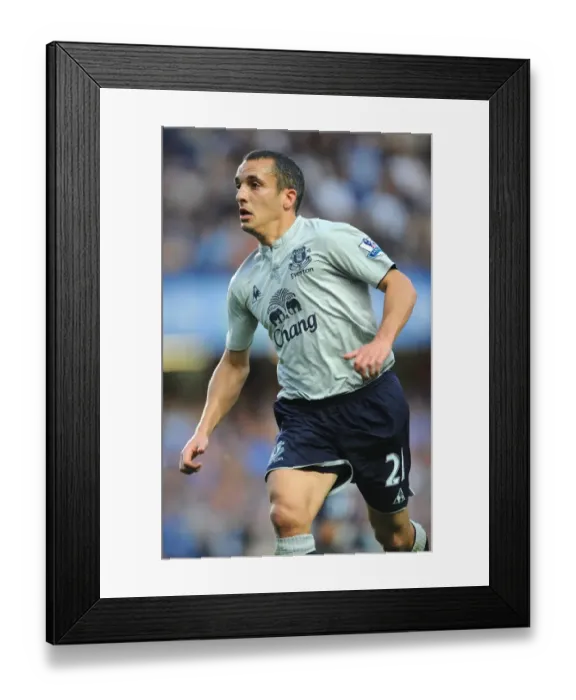 Framed Print : Everton's Leon Osman Faces Off Against Chelsea in Premier League Clash (15 October 2011) Framed Print : Everton's Leon Osman Faces Off Against Chelsea in Premier League Clash (15 October 2011)