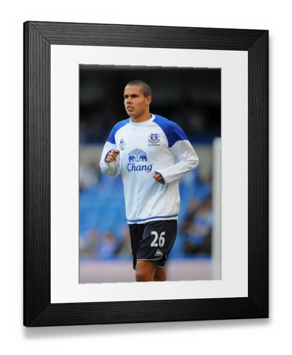 Framed Print : Jack Rodwell's Intense Warm-Up: Everton's Midfielder Prepares for Premier League Battle at Stamford Bridge (15 October 2011) Framed Print : Jack Rodwell's Intense Warm-Up: Everton's Midfielder Prepares for Premier League Battle at Stamford Bridge (15 October 2011)