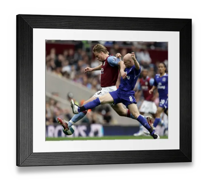 Framed Print : Intense Battle: Martin Laursen vs. Andrew Johnson - Premier League Showdown at Villa Park, September 23, 2007 Framed Print : Intense Battle: Martin Laursen vs. Andrew Johnson - Premier League Showdown at Villa Park, September 23, 2007