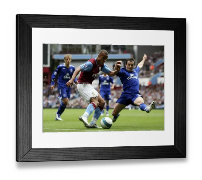 Framed Print : Football - Aston Villa v Everton Barclays Premier League - Villa Park - 23  /  9  /  07 Aston Villas Gabriel Agbonlahor (C) in action with Evertons Leighton Baines (R) Mandatory Credit: Action Images  /  Lee