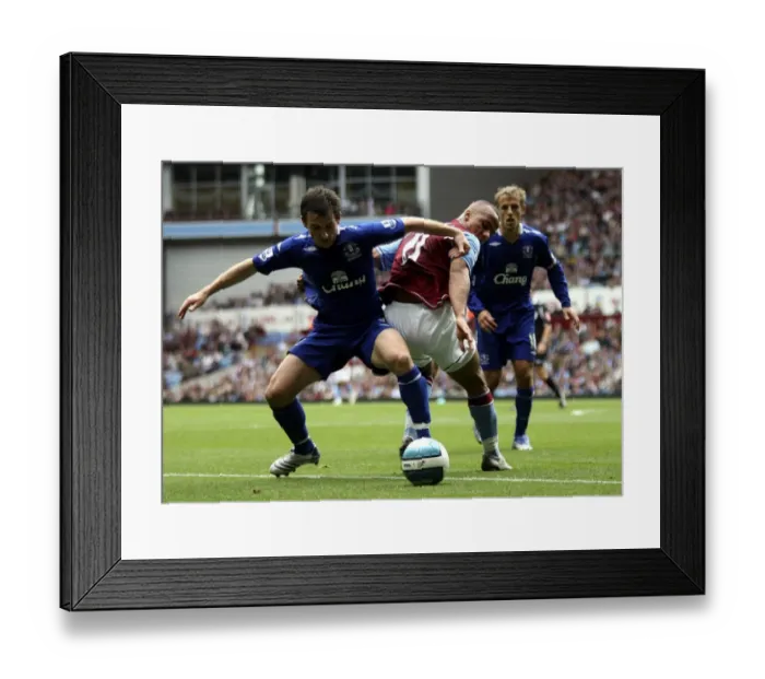 Framed Print : Agbonlahor vs. Baines: Intense Action from Aston Villa vs. Everton (2007) Football Match Framed Print : Agbonlahor vs. Baines: Intense Action from Aston Villa vs. Everton (2007) Football Match