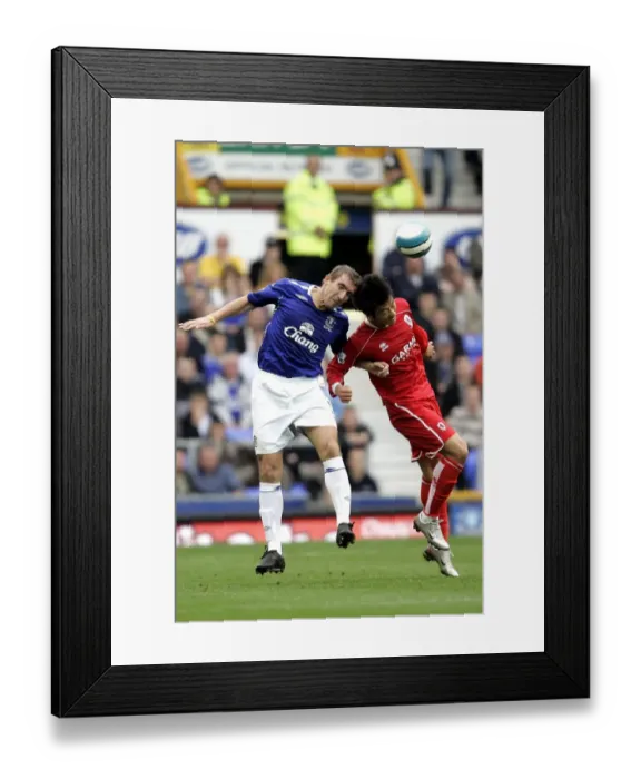 Framed Print : Alan Stubbs vs Dong-Gook Lee: Everton vs Middlesbrough Clash in the Barclays Premier League (September 30, 2007) Framed Print : Alan Stubbs vs Dong-Gook Lee: Everton vs Middlesbrough Clash in the Barclays Premier League (September 30, 2007)