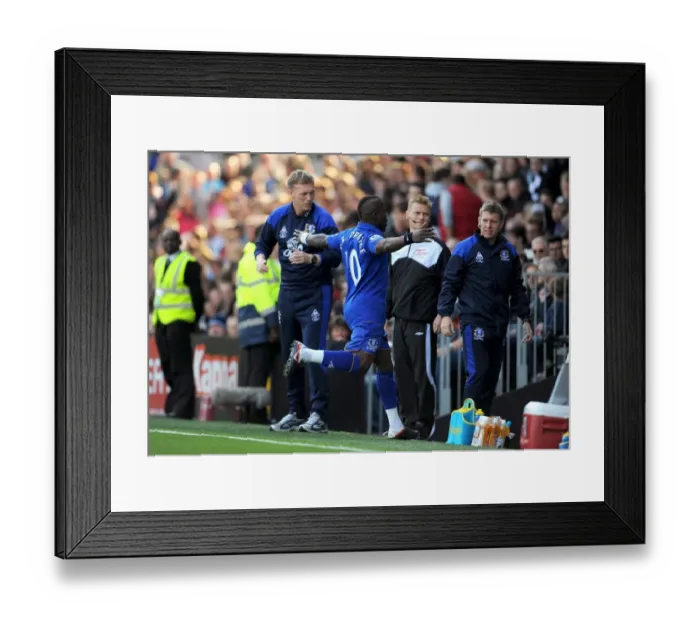 Framed Print : Royston Drenthe's Thrilling Goal Celebration: Everton's First in Premier League Clash vs. Fulham (23 October 2011) Framed Print : Royston Drenthe's Thrilling Goal Celebration: Everton's First in Premier League Clash vs. Fulham (23 October 2011)
