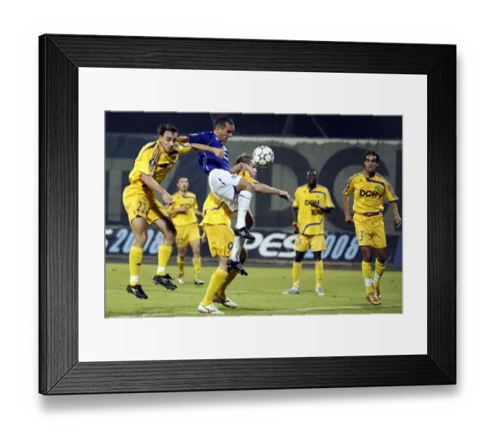 Framed Print : Osman vs Sliusar and Obradovic: Everton's Battle in UEFA Cup against Metalist Kharkiv Framed Print : Osman vs Sliusar and Obradovic: Everton's Battle in UEFA Cup against Metalist Kharkiv