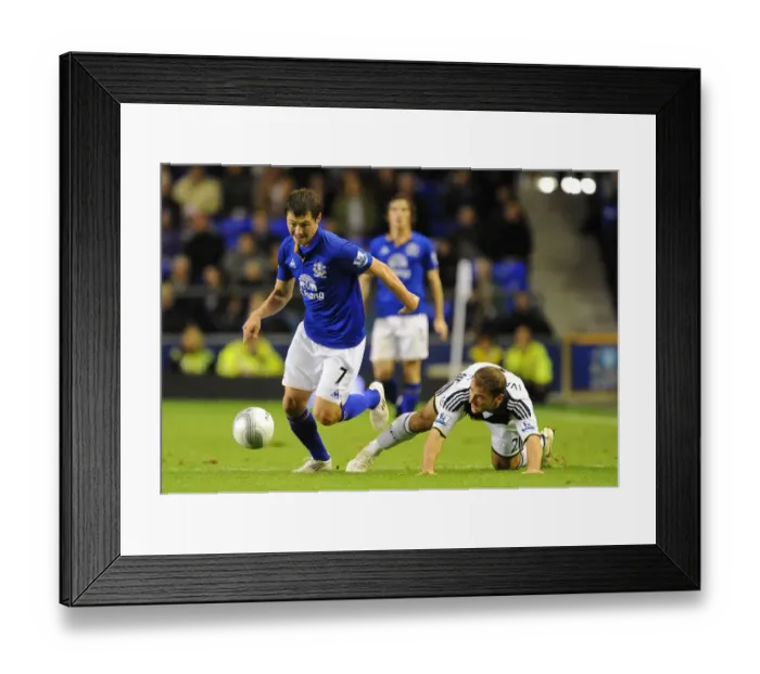 Framed Print : Battling for Control: Ivanovic vs. Bilyaletdinov in the Carling Cup Showdown at Goodison Park Framed Print : Battling for Control: Ivanovic vs. Bilyaletdinov in the Carling Cup Showdown at Goodison Park