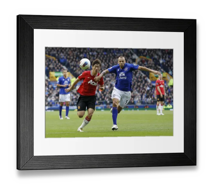 Framed Print : Battle for the Ball: Heitinga vs. Park - Everton vs. Manchester United Clash (BPL 2011) Framed Print : Battle for the Ball: Heitinga vs. Park - Everton vs. Manchester United Clash (BPL 2011)