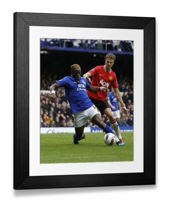Framed Print : Battle for the Ball: Evans vs. Saha - Everton vs. Manchester United, Premier League Rivalry (2011) Framed Print : Battle for the Ball: Evans vs. Saha - Everton vs. Manchester United, Premier League Rivalry (2011)