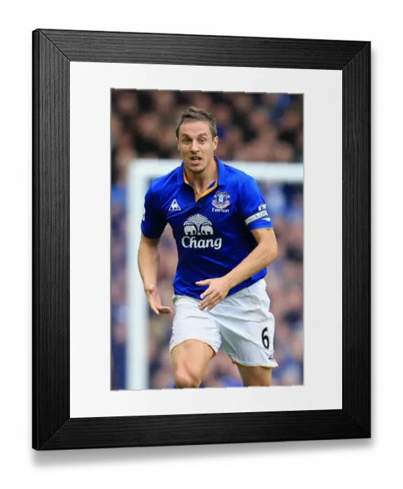 Framed Print : Everton's Jagielka in Action: Everton vs Manchester United, Barclays Premier League (2011) Framed Print : Everton's Jagielka in Action: Everton vs Manchester United, Barclays Premier League (2011)