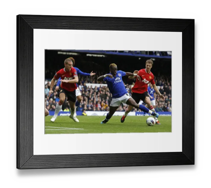 Framed Print : Everton vs Manchester United: A Premier League Battle - Evans vs Saha Showdown