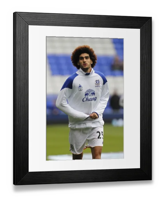 Framed Print : Marouane Fellaini's Focused Pre-Match Routine: Everton Star Gears Up vs. Manchester United (Barclays Premier League, 29 October 2011) Framed Print : Marouane Fellaini's Focused Pre-Match Routine: Everton Star Gears Up vs. Manchester United (Barclays Premier League, 29 October 2011)