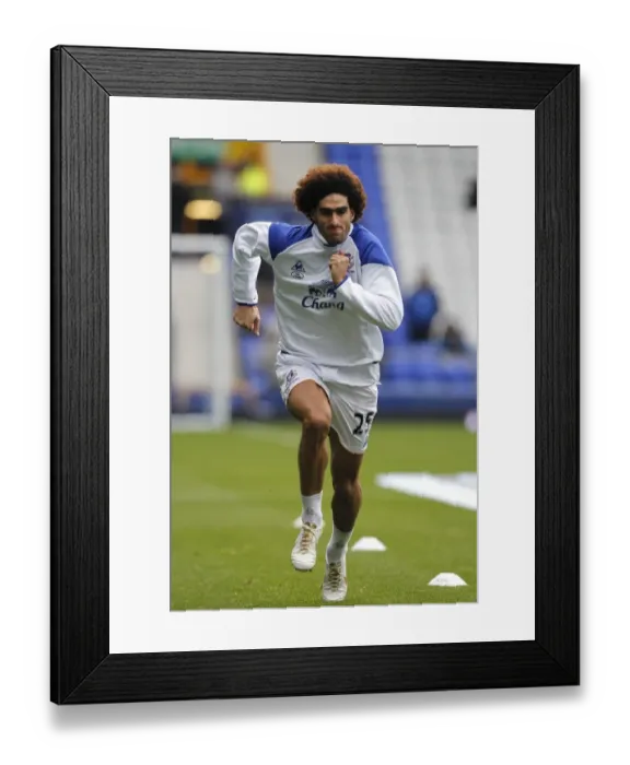 Framed Print : Marouane Fellaini's Intense Pre-Match Focus: Everton vs Manchester United (Premier League, 29 October 2011)