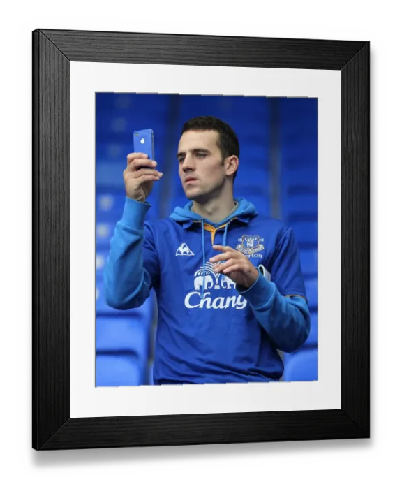 Framed Print : Everton vs Manchester United: A Fan's Passionate Snapshot from Goodison Park (2011, Barclays Premier League) Framed Print : Everton vs Manchester United: A Fan's Passionate Snapshot from Goodison Park (2011, Barclays Premier League)