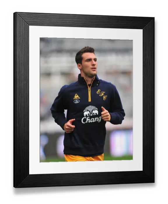 Framed Print : Apostolos Vellios Faces Newcastle United at St. James Park during Premier League Clash (November 2011)