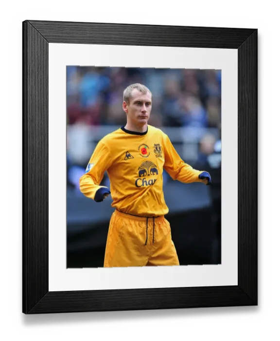 Framed Print : Tony Hibbert Goes Head-to-Head with Newcastle United at St. James Park (November 2011)